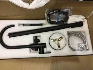 lot 86 image: Akdy 1-Handle Freestanding Floor Mount Tub Faucet Bathtub Filler with Hand Shower in Matte Black not used customer return
