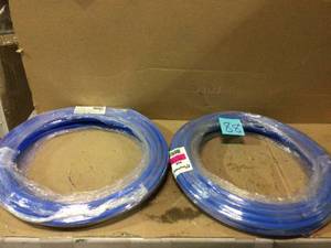 lot 88 image: Lot of 2 rolls of Shark Bite 12 in. x 50 ft. Blue Coil PEX Pipe not used