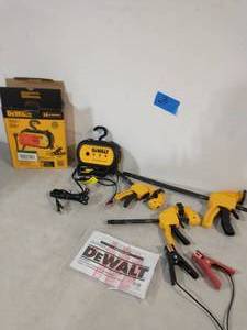 lot 3 image: DEWALT TRIGGER CLAMPS AND DEWALT 4 Amp Professional Waterproof Portable Car Battery Charger