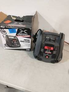 lot 13 image: Battery Extender 12-Volt 1,200 Amp Battery Jump Starter