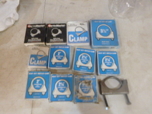 lot 96 image: 12 Muffler Clamps
