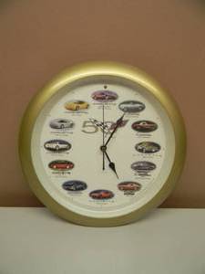 lot 32 image: 50TH ANNIVERSARY CORVETTE CLOCK - WORKS - NICE - SEE PICTURES