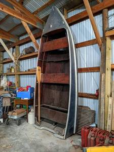 lot 100 image: Homemade Wood Boat w Homemade Trailer, Boat has Registration