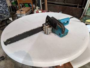 lot 169 image: Makita 14-34 Electric Chainsaw
