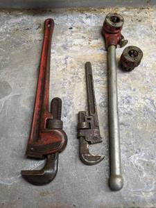 lot 222 image: Ridgid Pipe Threader w 34 and 12 Dies, 24 Ridgid Pipe Wrench and Roxby Pipe Wrench
