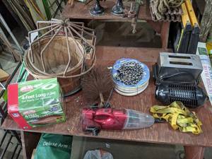 lot 409 image: 48 Inflatable Football, Apple Basket, Grate and More