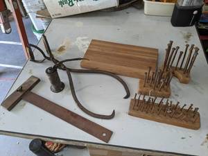 lot 376 image: Ice Tongs, Square Nail Collection, Oil Can and Cutting Board