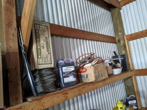 lot 392 image: Shelf Lot of Garage Items - Hardware, Roll of Steel Cable, Johnson 2-Cycle Oil and More