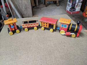 lot 484 image: Vintage Fisher Price Huffy Puffy Wood Train Set