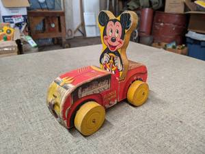 lot 490 image: Vintage Fisher Price Mickey Mouse Puddle Jumper Wood Car