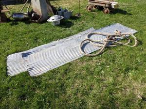 lot 556 image: Heavy Duty Rope with Shackles and (3) Pieces of Barn Tin