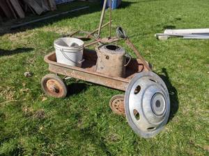 lot 560 image: Steel Childrens Wagon, Hubcap and Coffee Pot