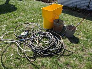 lot 584 image: Lot of Galvanized Buckets, Poly Container, Hoses and More