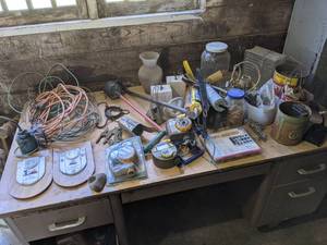 lot 596 image: Contents of Metal Desk - Water Meters, Vintage Hanging Scale and More