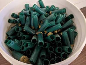 lot 63 image: 5 Gallon Bucket Remington 12 GA  2.75 Spent Shotgun Shells