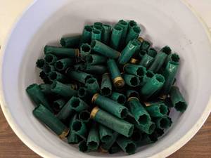 lot 65 image: 5 Gallon Bucket Remington 12 GA  2.75 Spent Shotgun Shells