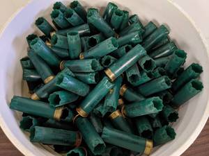 lot 66 image: 5 Gallon Bucket Remington 12 GA  2.75 Spent Shotgun Shells