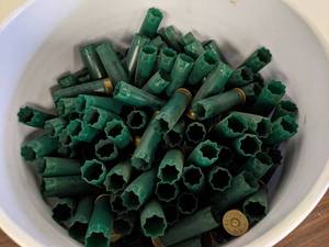 lot 69 image: 5 Gallon Bucket Remington 12 GA  2.75 Spent Shotgun Shells