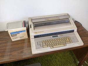 lot 101 image: Xerox Memorywriter Electric Typewriter w Manual and Extra Ribbons