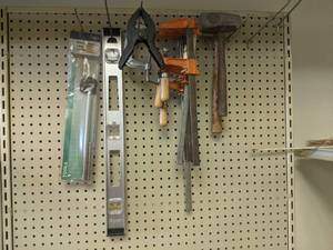 lot 127 image: Bar Clamps, Aluminum Level and More on Wall
