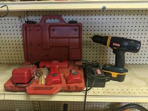 lot 125 image: Ryobi 18V 12 Cordless Drill and Charger & Milwaukee 38 Cordless Kit (Needs Repair)