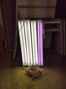 lot 168 image: (4) 48 Shop Lights, Power Strips and Extension Cord