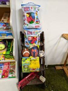lot 181 image: Shelf with Assorted NEW Toys - Mega Blocks, Nerf, Legos and More