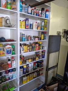 lot 221 image: 9 Shelves of Cleaning Products, Stain, Paint, Thinner and More