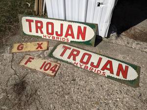 lot 43 image: Lot of 2 Vintage Embossed Seed Signs - TROJAN Hybrid  2 Corn Markers
