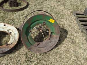 lot 86 image: Pair of Tractor Wheel Weights - #HA1235B and Wagon Wheel