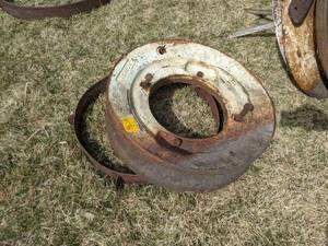 lot 85 image: Pair of Tractor Wheel Weights and Steel Wheel - #105462A