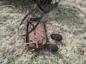 lot 83 image: Wagon Wheel and Old Wagon w (1) Set of Wheels
