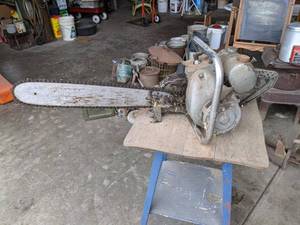 lot 137 image: Vintage David Bradley Chainsaw - Motor Pulls Over