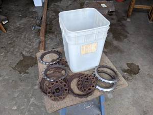 lot 163 image: Bucket of Cast Iron  Steel Seed Plates