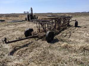 lot 66 image: Kewanee 7-Section Spike Tooth Harrow  Drag on Carrier