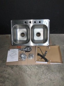 lot 5 image: GLACIER BAY ALL-IN-ONE DROP-IN STAINLESS STEEL 33 IN. 4-HOLE DOUBLE BOWL KITCHEN SINK. SEE PICTURES