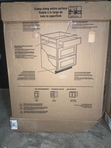 lot 21 image: HAMPTON BAY ASSEMBLED 18X34.5X24 IN. BASE KITCHEN CABINET IN UNFINISHED BEECH. SEE PICTURES