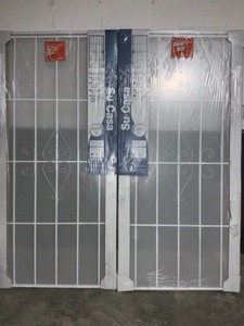 lot 24 image: (2) UNIQUE HOME DESIGNS 36 IN. X 80 IN. SU CASA WHITE SURFACE MOUNT OUTSWING STEEL SECURITY DOOR WITH EXPANDED METAL SCREEN. SEE PICTURES