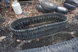 lot 5 image: Set of Cat Multi Terrain Skid Loader Tracks of Model 257D