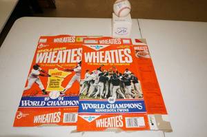 lot 31 image: 2 Twins Wheaties Boxes - Kent Hrbek Signed Ball