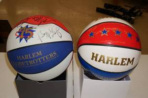 lot 50 image: Harlem Globetrotters Signed Ball and Commemorative