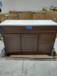 lot 25 image: HOME DECORATOR COLLECTION Sedgewood 48-12 in. W Bath Vanity in Dark Cognac with Solid Surface Technology Vanity Top in Arctic with White Sink