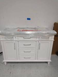 lot 21 image: Sonoma 48 in. W x 22 in. D Vanity in White with Carrara Marble Top with White Sinks