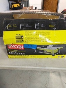 lot 32 image: Ryobi 0.75 HP 7 in. 4.8 Amp Tabletop Tile Saw