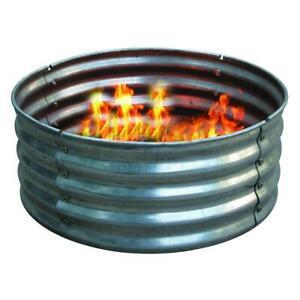 lot 65 image: Infinity 36 in. x 13 in. Round Galvanized Steel Wood Fire Ring