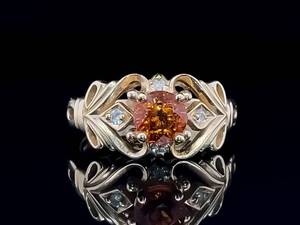 lot 34 image: Orange Garnet and Diamond Estate Ring in 14k Yellow Gold $1,999 RETAIL