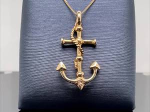 lot 51 image: Stylish 14k Yellow Gold and Diamond Anchor Pendant $999 Retail
