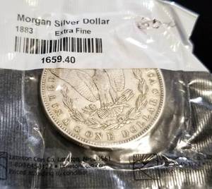 lot 42 image: 1883 MORGAN SILVER DOLLAR XF