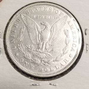 lot 54 image: 1879 MORGAN SILVER DOLLAR CLEANED