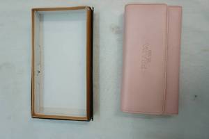 lot 147 image: Prada Milano wallet